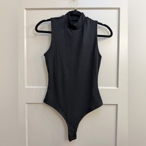 Cider Black Sleeveless Ribbed Bodysuit